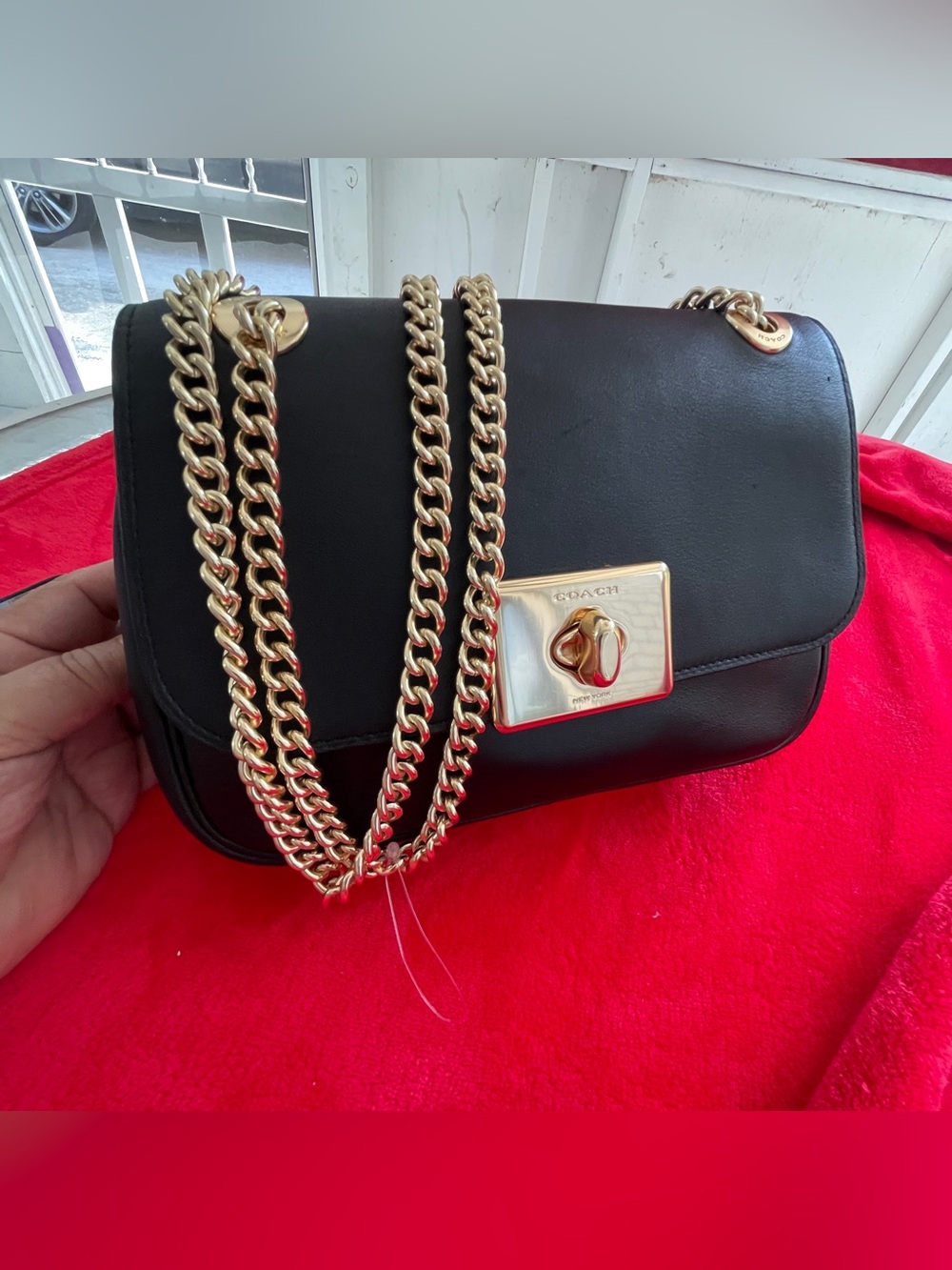Coach Black Leather Shoulder Bag with Gold Chain Strap and Turnlock